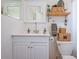 Bathroom features built-in shelving with storage baskets at 12595 95Th N St, Largo, FL 33773