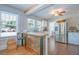 Bright kitchen featuring a breakfast bar, stainless steel appliances, and an eat-in area at 12595 95Th N St, Largo, FL 33773