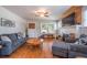 Inviting living room featuring gleaming hardwood floors, and stylish furnishings at 12595 95Th N St, Largo, FL 33773