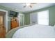 Spacious main bedroom has a TV, ceiling fan, and ensuite bathroom at 12595 95Th N St, Largo, FL 33773