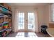 Bright sunroom has double doors leading to the outside at 12595 95Th N St, Largo, FL 33773