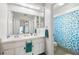 Bathroom with double sinks and a shower tub combo at 13003 Titleist Dr, Hudson, FL 34669