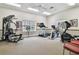 Gym with various exercise machines and a ceiling fan at 13003 Titleist Dr, Hudson, FL 34669