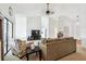 Comfortable living room with vaulted ceilings and views to the backyard at 13003 Titleist Dr, Hudson, FL 34669