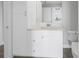 Bathroom featuring a vanity with a white countertop, storage and a mirror at 1325 Snell Isle Ne Blvd # 505, St Petersburg, FL 33704
