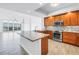 Modern kitchen with granite countertops, stainless steel appliances, and an island with a sink at 1325 Snell Isle Ne Blvd # 505, St Petersburg, FL 33704