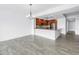 Kitchen and dining area with island, granite countertops, and stainless appliances at 1325 Snell Isle Ne Blvd # 505, St Petersburg, FL 33704