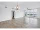 Spacious living room featuring large windows, ceiling fan, and water views at 1325 Snell Isle Ne Blvd # 505, St Petersburg, FL 33704