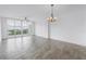 Bright living room with water views, ceiling fan, and tile flooring at 1325 Snell Isle Ne Blvd # 505, St Petersburg, FL 33704