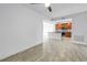 Living space adjacent to the kitchen featuring an open layout, tile flooring and ceiling fan at 1325 Snell Isle Ne Blvd # 505, St Petersburg, FL 33704