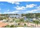 Beautiful waterfront views with boats docked and palm trees, perfect for a relaxing lifestyle at 1325 Snell Isle Ne Blvd # 505, St Petersburg, FL 33704