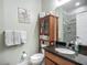 Bathroom includes a granite countertop, cabinet and marble tile shower at 13608 Artesa Bell Dr, Riverview, FL 33579