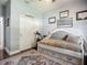 Comfortable bedroom features neutral walls, ceiling fan, closet and and a patterned rug at 13608 Artesa Bell Dr, Riverview, FL 33579