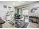 Eat-in kitchen and dining area provides access to the screened patio and outdoor dining at 13608 Artesa Bell Dr, Riverview, FL 33579