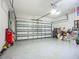 Spacious two-car garage with ample storage space at 13608 Artesa Bell Dr, Riverview, FL 33579