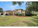 Beautiful single-story home with lush front lawn and landscaping, plus a two-car garage at 14042 Marlberry Way, Odessa, FL 33556