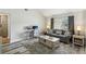 Comfortable living room with modern desk and gray color palette at 1421 Buckner Rd, Valrico, FL 33596