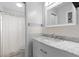 Modern bathroom features a marble vanity, white subway tile, and updated fixtures at 1489 77Th N Ave, St Petersburg, FL 33702