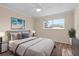Comfortable bedroom with large window, neutral colors, and a plush rug at 1489 77Th N Ave, St Petersburg, FL 33702