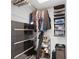 Walk-in closet with built-in storage solutions for organization at 1489 77Th N Ave, St Petersburg, FL 33702