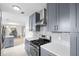 Beautiful kitchen with stainless steel oven, stylish backsplash and ample storage space at 1489 77Th N Ave, St Petersburg, FL 33702
