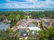Aerial view showcasing the property's prime location near the bay, lush landscaping, and outdoor living spaces at 1515 Park N St, St Petersburg, FL 33710