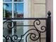 Balcony detail with intricate wrought iron railing enhances this property at 1515 Park N St, St Petersburg, FL 33710