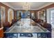 Formal dining room showcasing a glass-top table and decorative chandelier at 1515 Park N St, St Petersburg, FL 33710