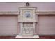 Elaborate front exterior feature with stone design is located above the garage entrances at 1515 Park N St, St Petersburg, FL 33710