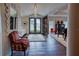 Elegant foyer featuring tile floors, a chandelier and decorative accents at 1515 Park N St, St Petersburg, FL 33710