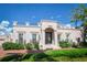 Elegant home featuring a brick walkway, decorative windows and metal balcony details at 1515 Park N St, St Petersburg, FL 33710
