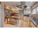 Modern kitchen features a central island, stainless appliances, and hanging pot rack at 1515 Park N St, St Petersburg, FL 33710