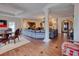 Open-concept living space with tile floors, columns, and decorative furniture at 1515 Park N St, St Petersburg, FL 33710