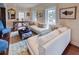 Bright and airy living room featuring sofas and large windows at 1515 Park N St, St Petersburg, FL 33710