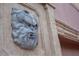 A close-up of a decorative sculpture detail on the exterior at 1515 Park N St, St Petersburg, FL 33710
