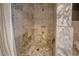 Marble shower with ornate gold fixtures at 1515 Park N St, St Petersburg, FL 33710