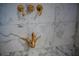 Close up of ornate, swan-shaped fixtures in shower at 1515 Park N St, St Petersburg, FL 33710