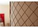 A tight close up of a wall with a quilted or geometric pattern at 1515 Park N St, St Petersburg, FL 33710