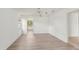 Neutral bedroom with new flooring and a ceiling fan at 1613 Comfy Ct, Sun City Center, FL 33573