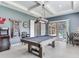 Game room with pool table and access to the pool area at 16220 Lake Armistead Way, Odessa, FL 33556