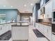 Kitchen featuring modern appliances and seamless transition to the dining area at 16220 Lake Armistead Way, Odessa, FL 33556