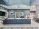Large open-concept living room with vaulted ceilings, recessed lights, and tile flooring at 16220 Lake Armistead Way, Odessa, FL 33556