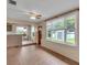 Inviting room boasts natural light with tile floors, front door, and large windows at 1666 Souvenir Dr, Clearwater, FL 33755