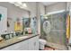 Bathroom boasting vanity, toilet and walk-in shower with mermaid decor at 1696 Hidden Springs Dr, Trinity, FL 34655
