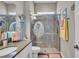 Bathroom with vanity, toilet and mermaid themed shower at 1696 Hidden Springs Dr, Trinity, FL 34655