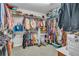 Walk-in closet with shelving and hanging storage at 1696 Hidden Springs Dr, Trinity, FL 34655