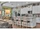 Bright eat-in kitchen with island and white cabinets is great for entertaining at 1696 Hidden Springs Dr, Trinity, FL 34655