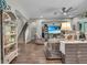 Open floor plan leads to the staircase and a spacious and bright living area at 1696 Hidden Springs Dr, Trinity, FL 34655