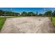 Outdoor basketball court with multiple hoops, providing a great space for recreational activities at 1712 Crossvine Ct, Trinity, FL 34655