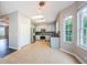 Well-lit kitchen boasts stainless steel appliances and lots of natural light at 1712 Crossvine Ct, Trinity, FL 34655